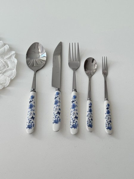 معالق وشوك وسكاكين مورد يد بورسلان