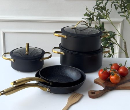 طقم طناجر يد ذهبي اسود