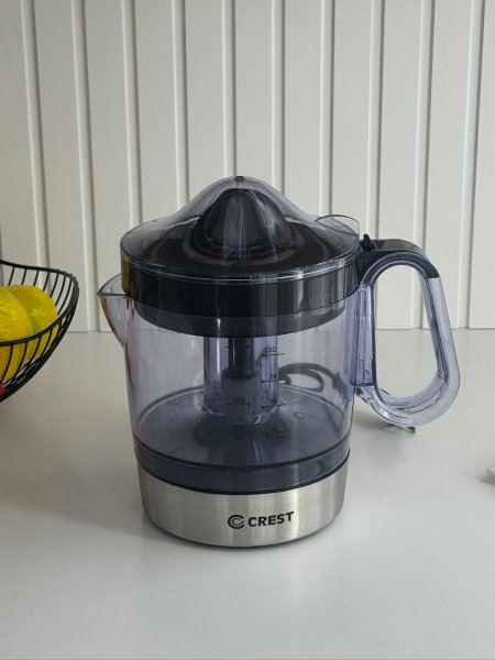 عصاره حمضيات وعاء زجاج