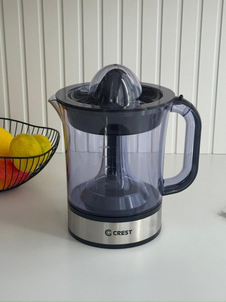 عصاره حمضيات وعاء زجاج