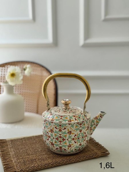 ابريق شاي يد ذهبي