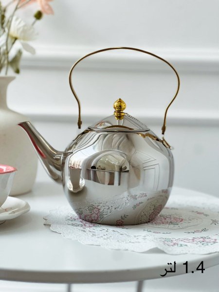 ابريق شاي يد ذهبي